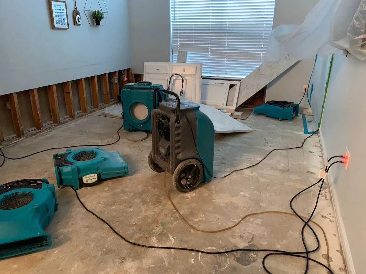 Dehumidifier in flood-cut room for Water Damage Restoration in Keokuk